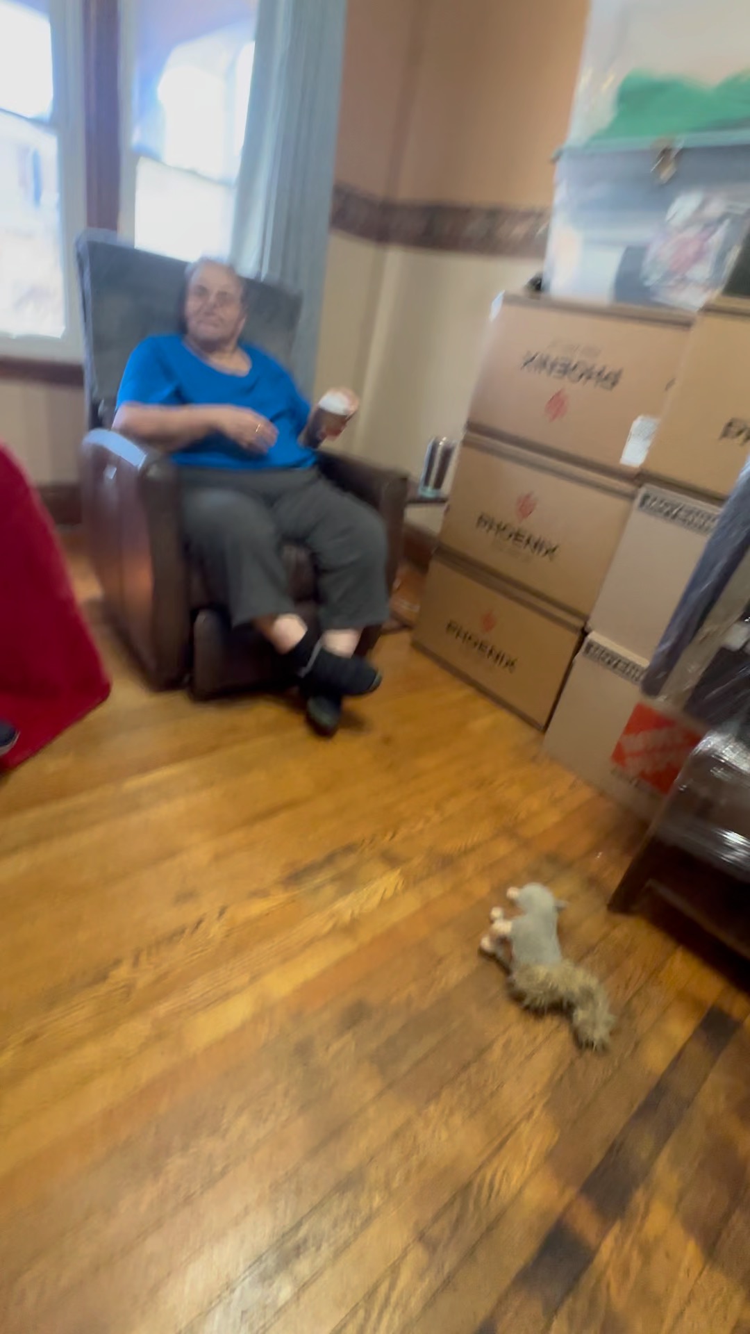 Happy homeowner on moving day after selling to I Buy Ugly Houses